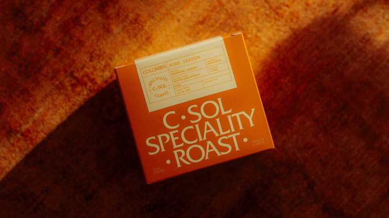 C-Sol Speciality Roast coffee box on a textured surface